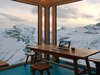 Die bodentiefen Fenster im neuen Holzbau bieten einen grandiosen Ausblick über die Berggipfel der Walliser Alpen.
